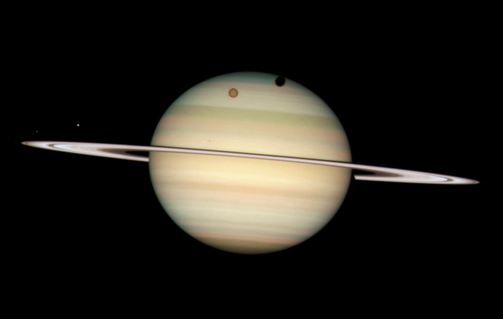 Saturn's Moons in Passing