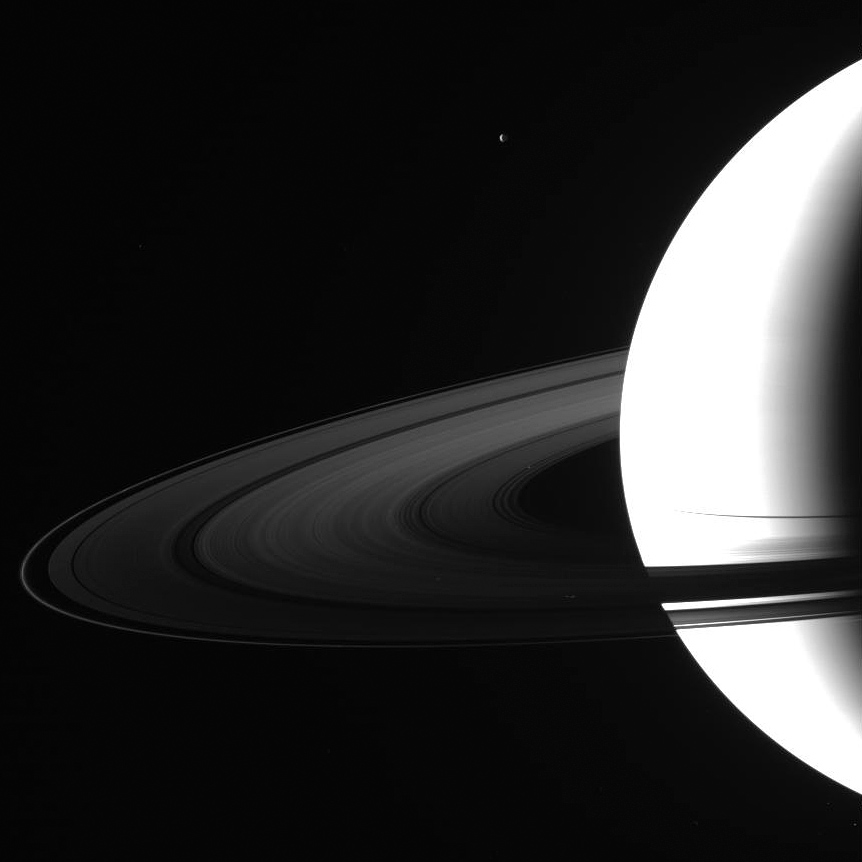 Cassini photographs Saturn and moon