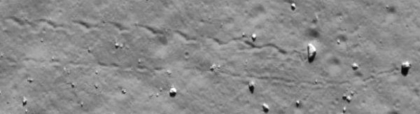 A triangular boulder leaves a sidewinding trail