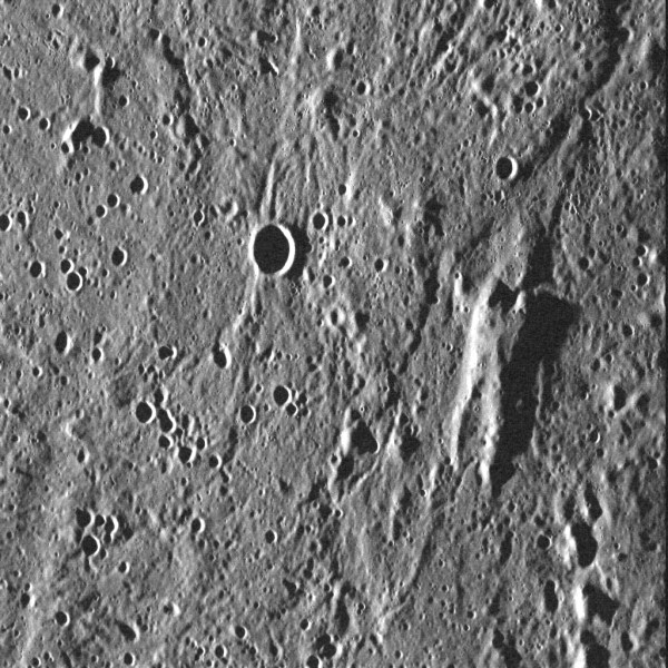 A curiously human shape rises from the surface of Mercury in this MESSENGER image