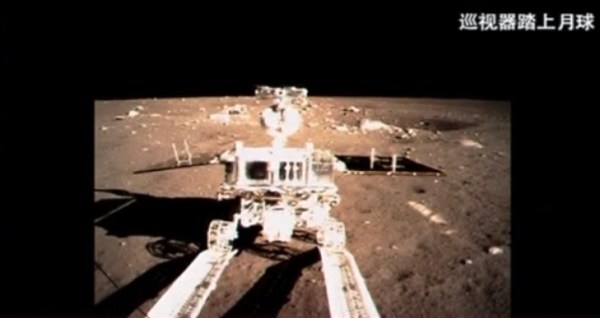 Screenshot of a CCTV video showing the Yutu rover rolling onto the lunar surface (CCTV)