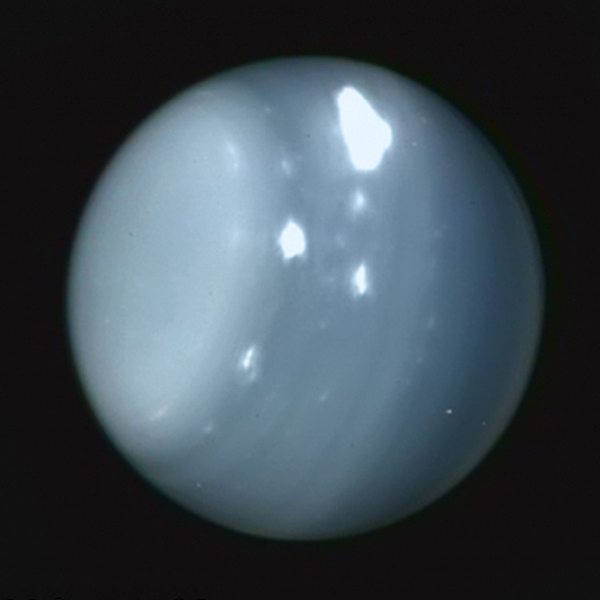 Infrared image of Uranus acquired from the Keck Observatory on Aug. 6 2014 (Imke de Pater (UC Berkeley)/Keck Observatory) Colored with Voyager true-color data.