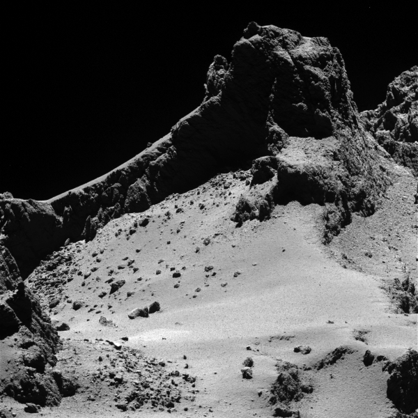 A section of the smaller of 67P's two lobes as seen by OSIRIS' narrow-angle camera from a distance of about 8km on October 14, 2014. The resolution is 15 cm/pixel. Credit: ESA/Rosetta/MPS for OSIRIS Team MPS/UPD/LAM/IAA/SSO/INTA/UPM/DASP/IDA