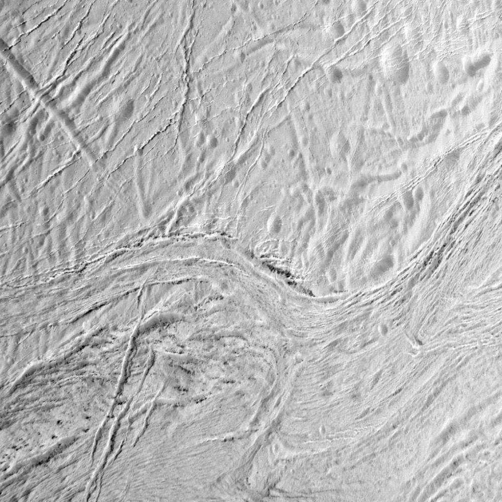 Frozen fractures: deep furrows in Enceladus' south polar region known as Samarkand Sulci (NASA/JPL/SSI)