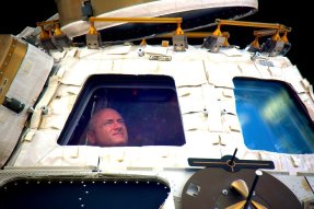 Photo of Scott Kelly inside the Cupola on the ISS (NASA)