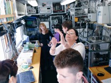 NASA Social attendees check out a modular NOAA lab aboard Atlantis