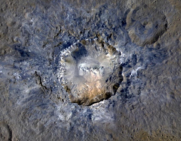 Enhanced-color view of Haulani Crater on Ceres. Credit: NASA/JPL-Caltech/UCLA/MPS/DLR/IDA