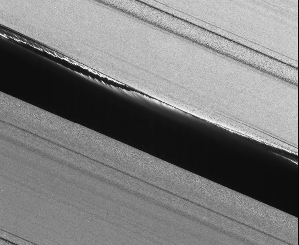 Cassini narrow-angle camera image of the Keeler Gap after Daphnis' passing. NASA/JPL/SSI (original here)